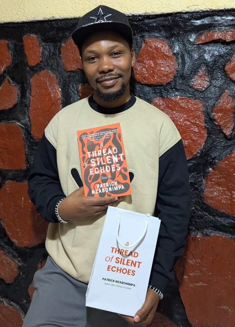A reader with the book and its gift bag
